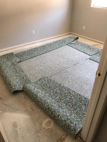 Removing old carpet padding